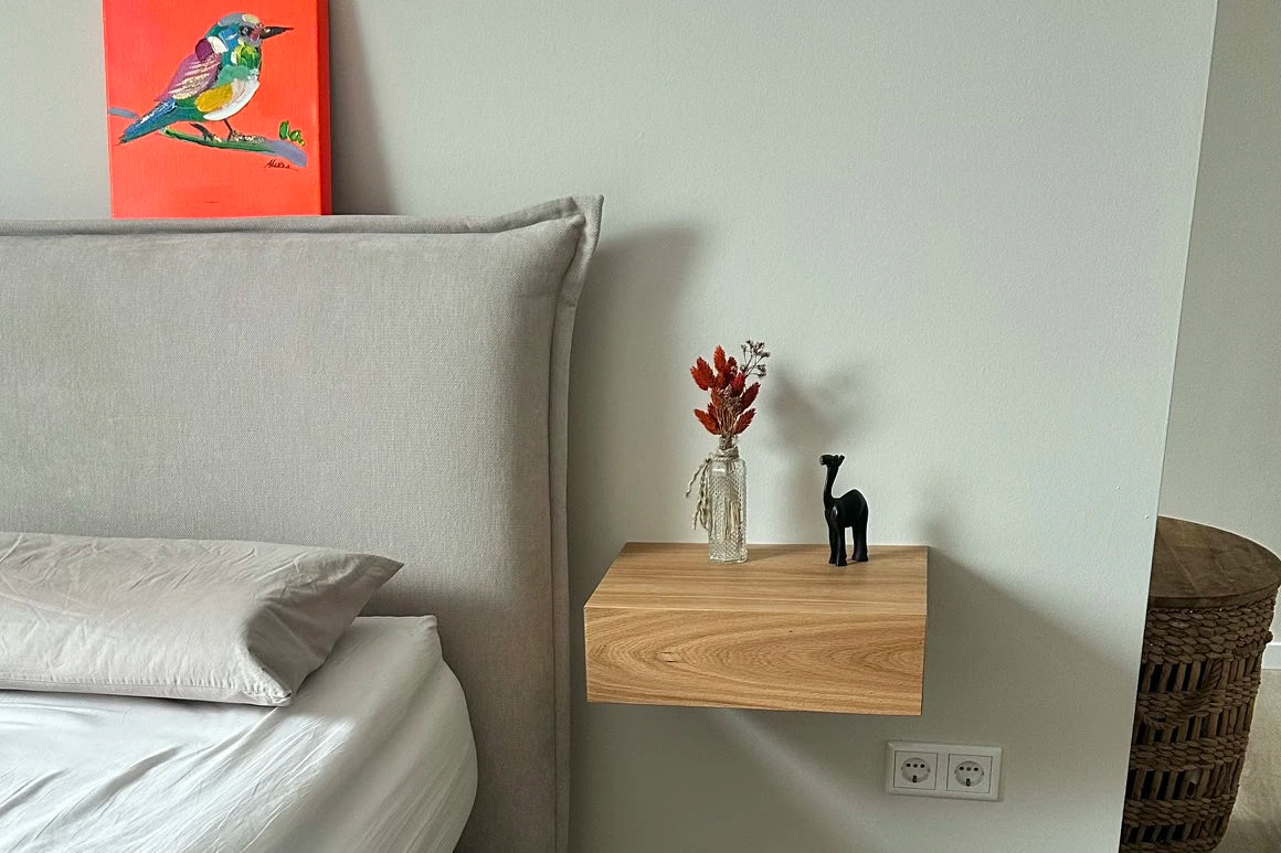 oak floating nightstand in bedroom