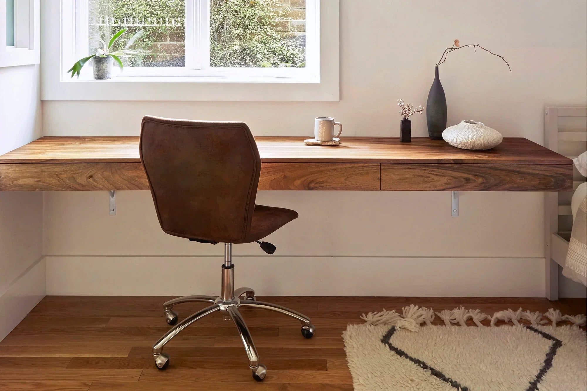 bedroom with floating desk