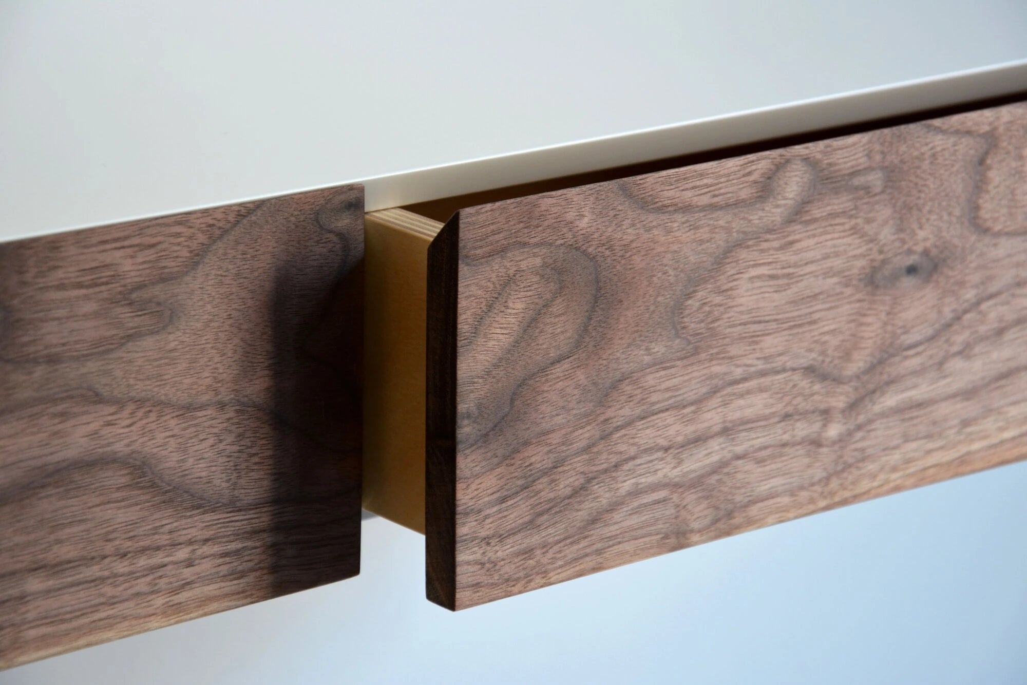 floating dressing table with walnut drawers