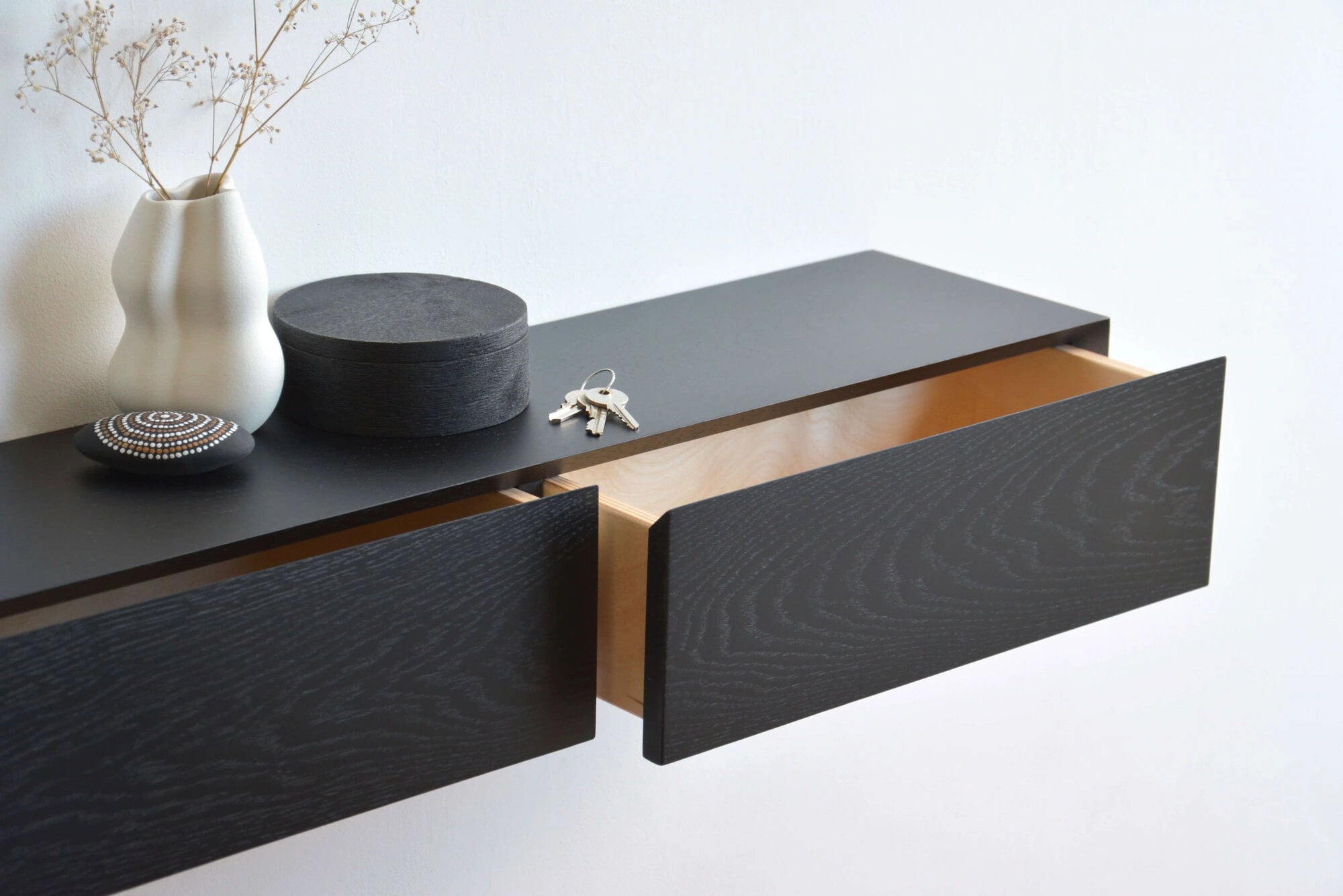 black floating entryway shelf
