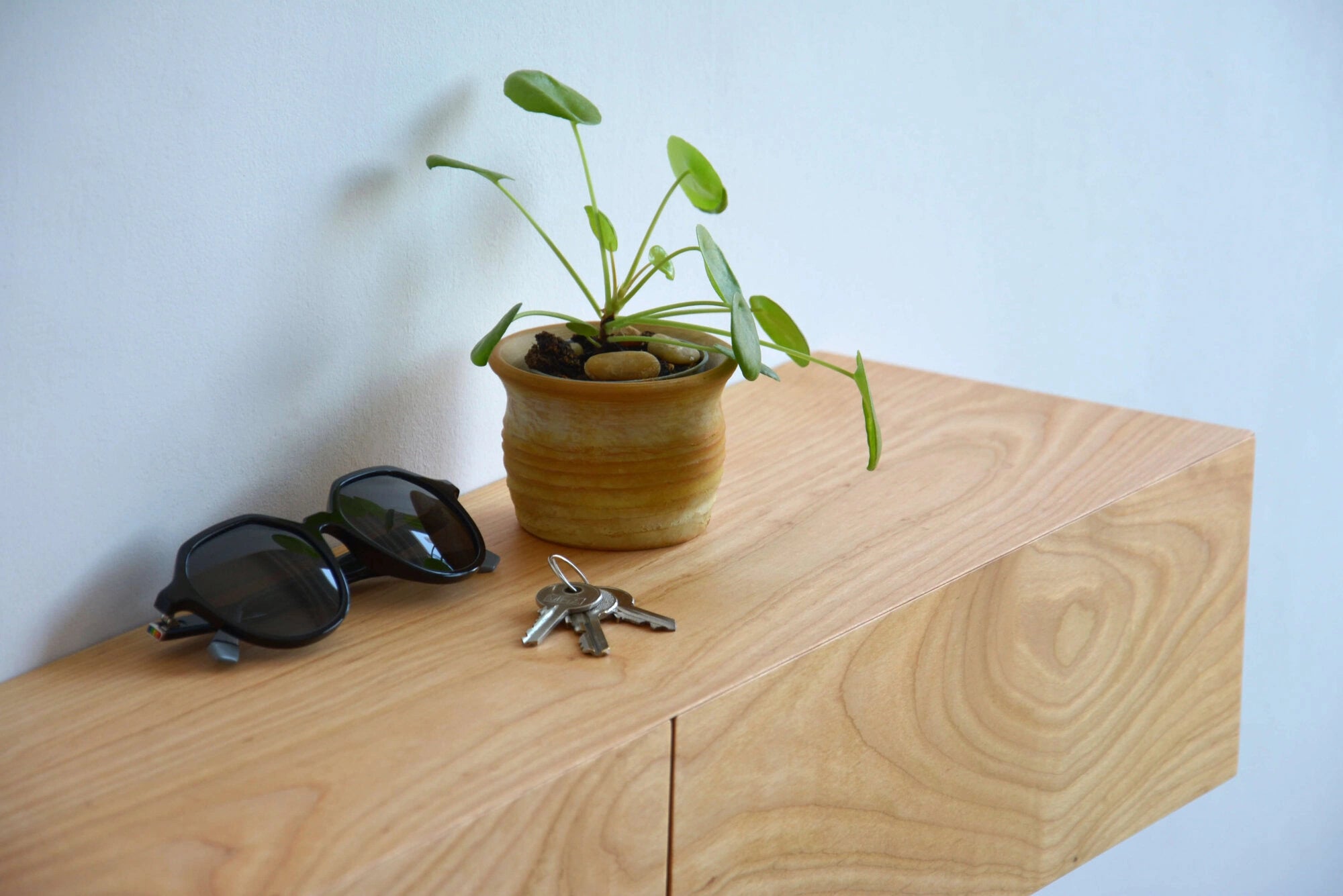 entryway storage made of cherry