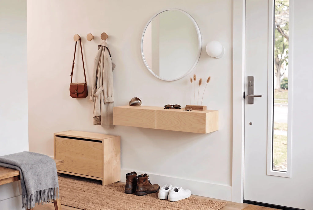 entryway with maple furniture