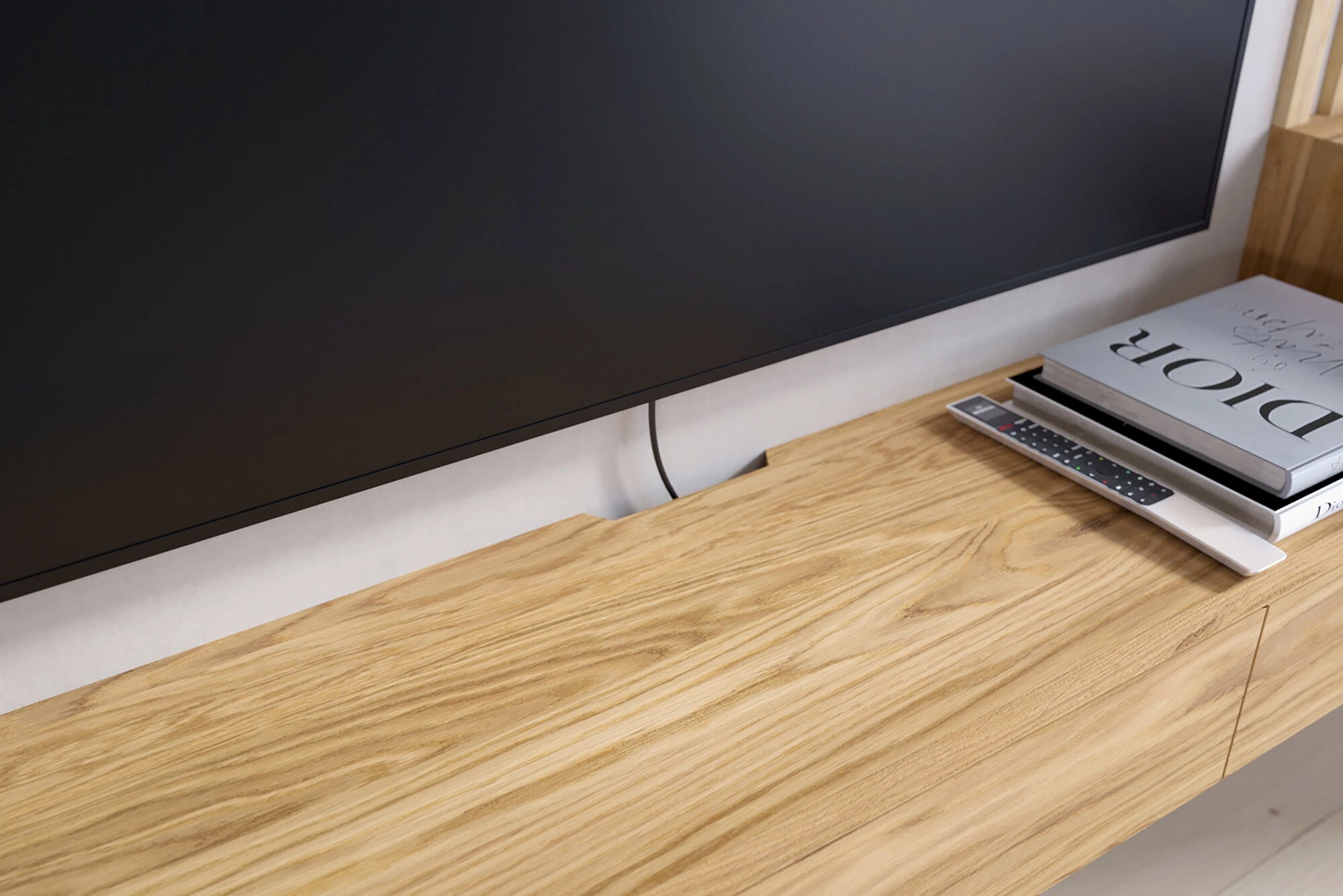 floating TV stand with cable cutout
