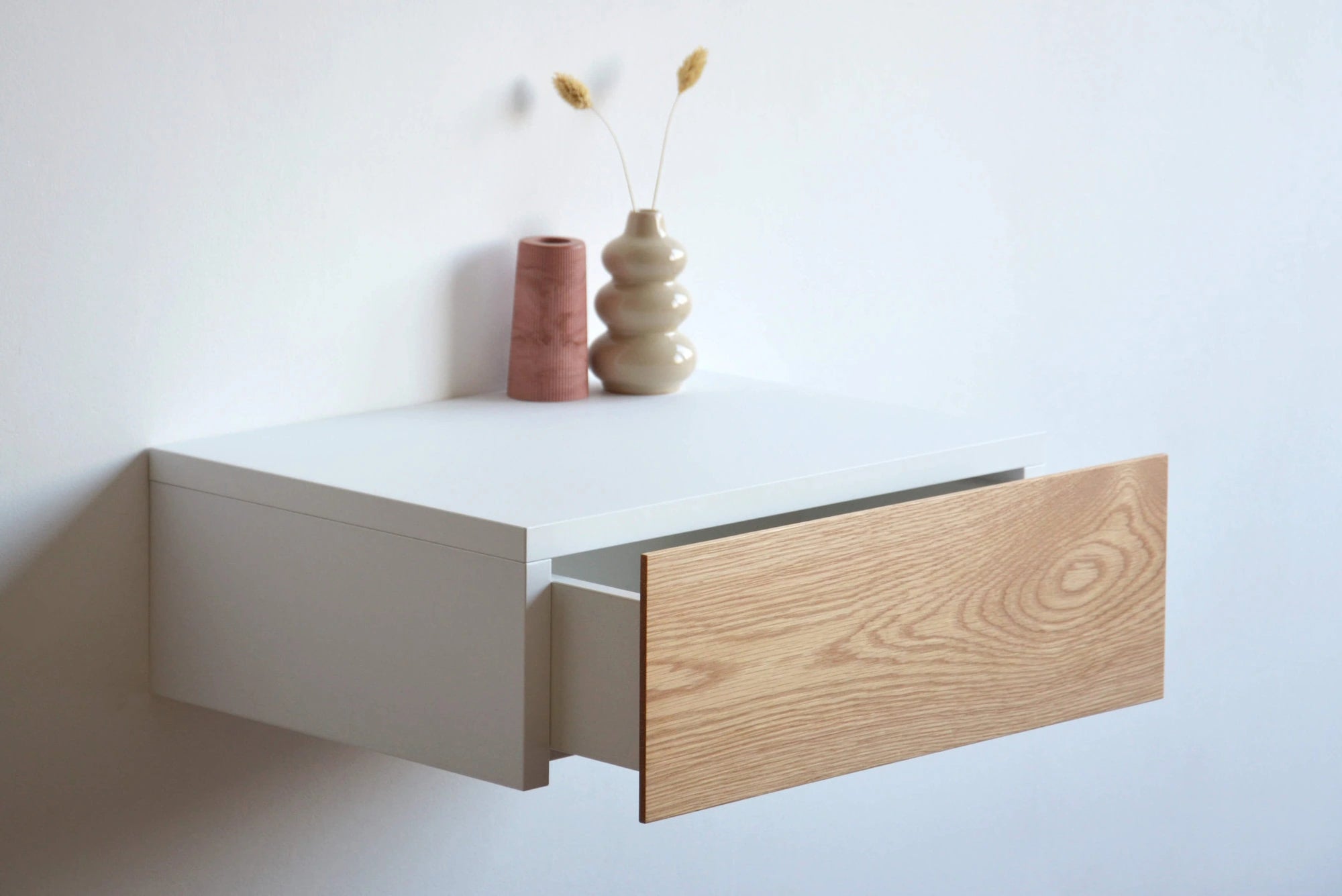 floating bedside table with oak drawer