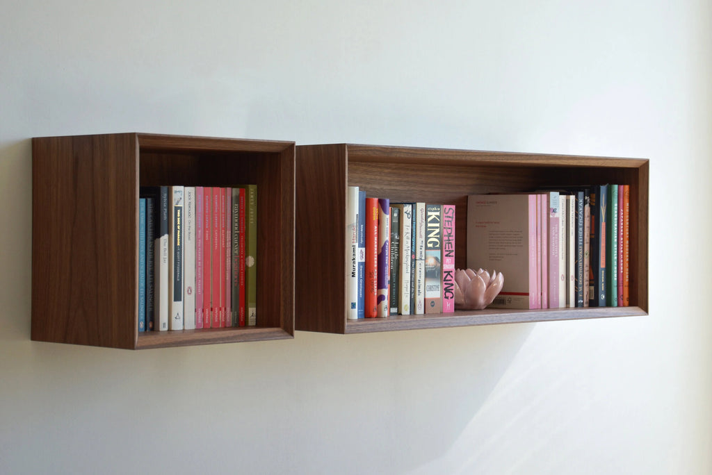 floating bookcase made of walnut veneer