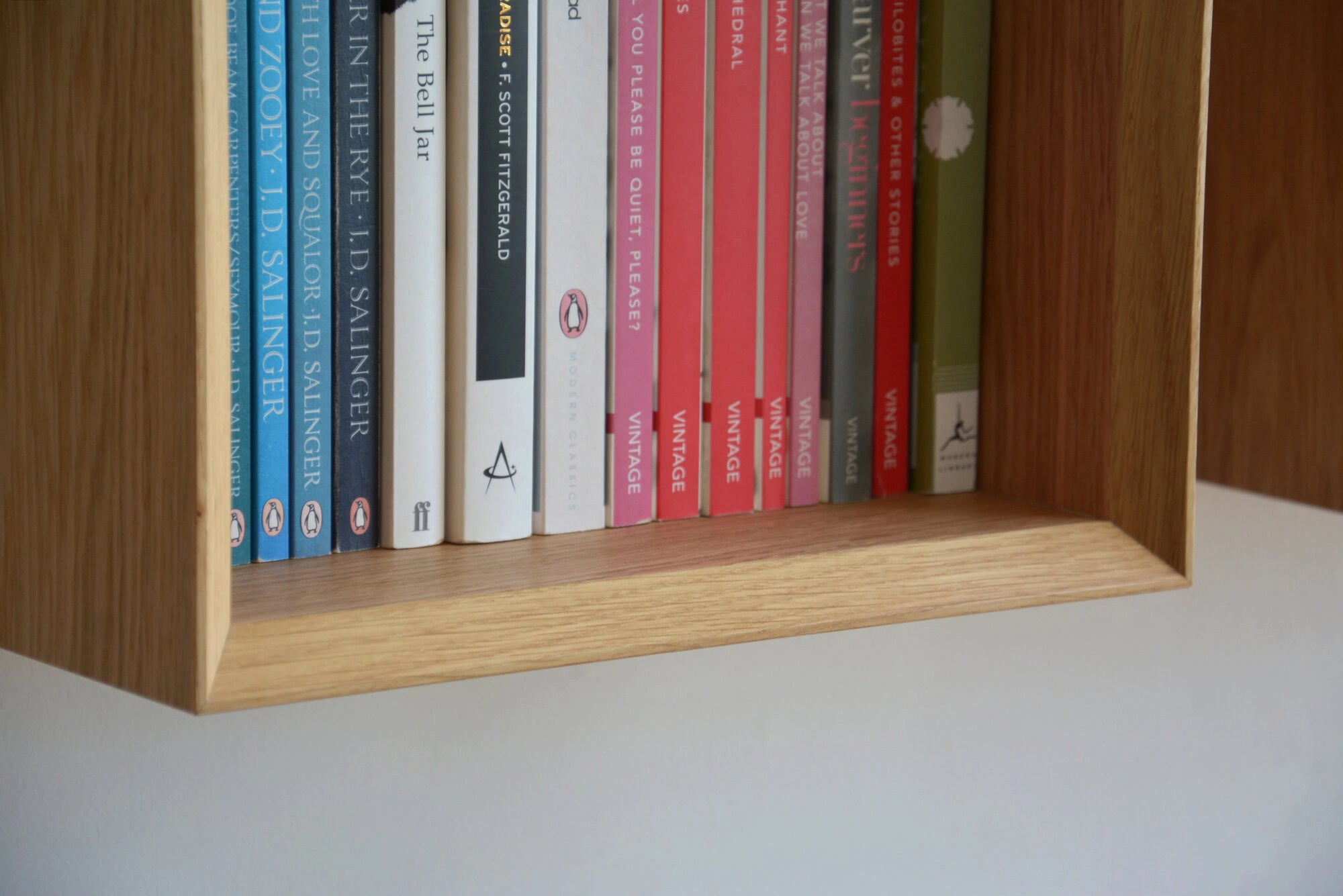 floating bookshelf with mitered edge