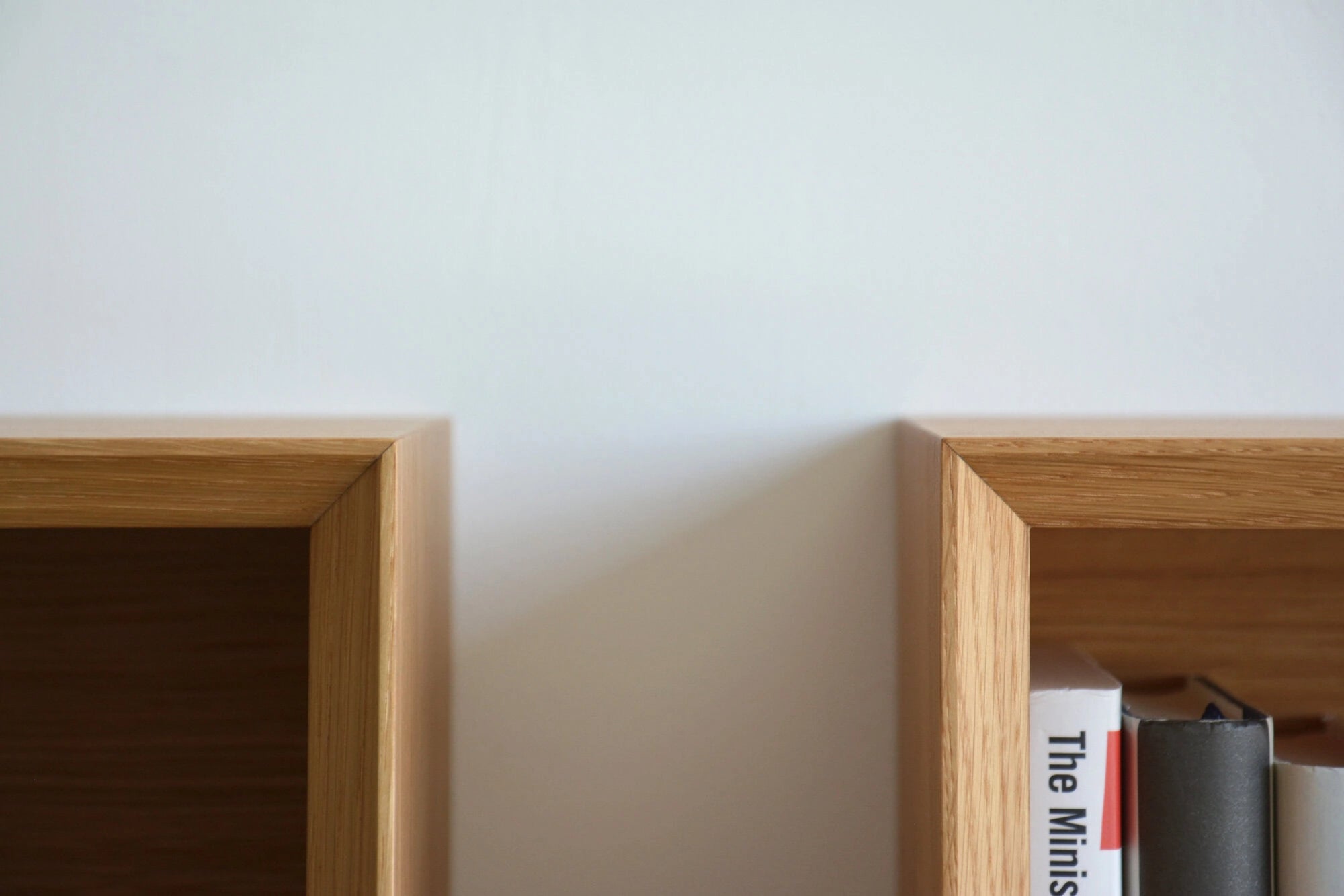 floating bookshelves with mitered edges