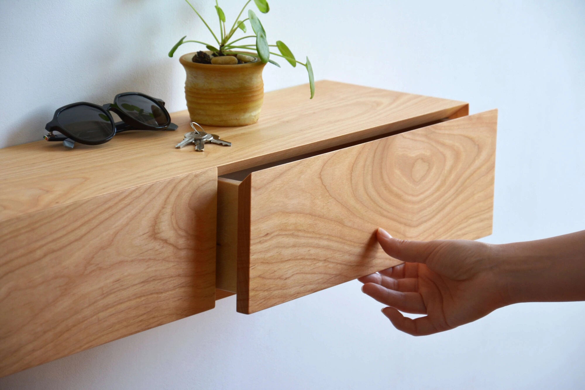 floating entryway shelf made of cherry