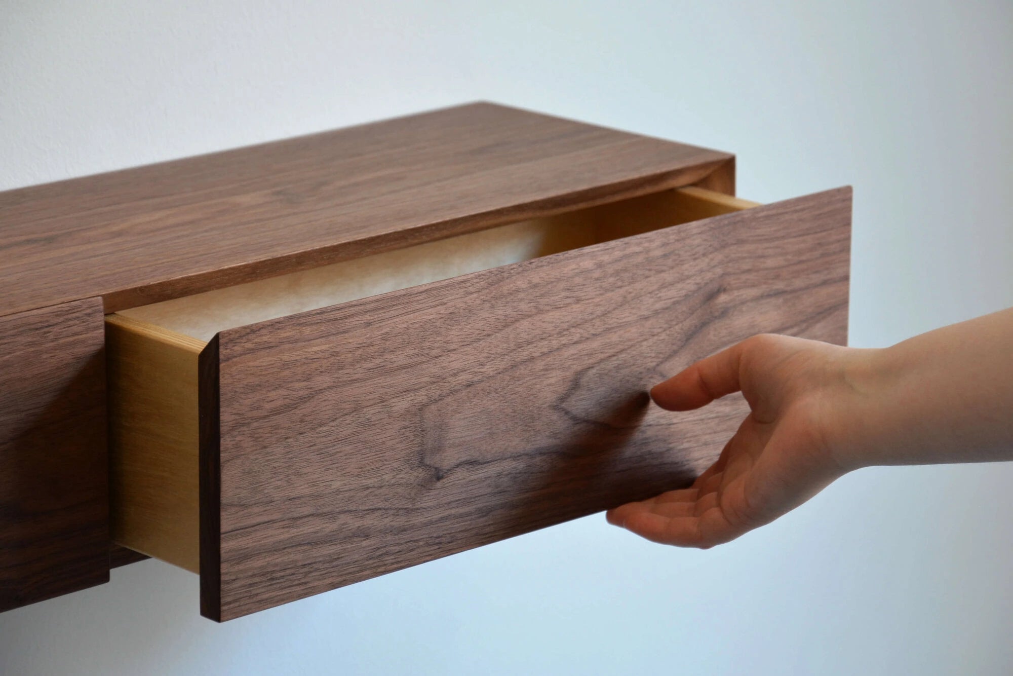 floating entryway shelf with hidden drawers