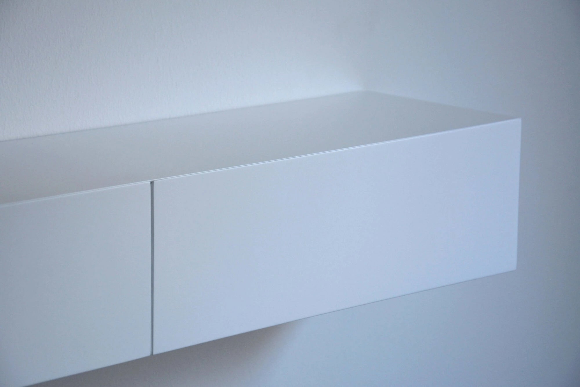 floating entryway shelf with hidden drawer