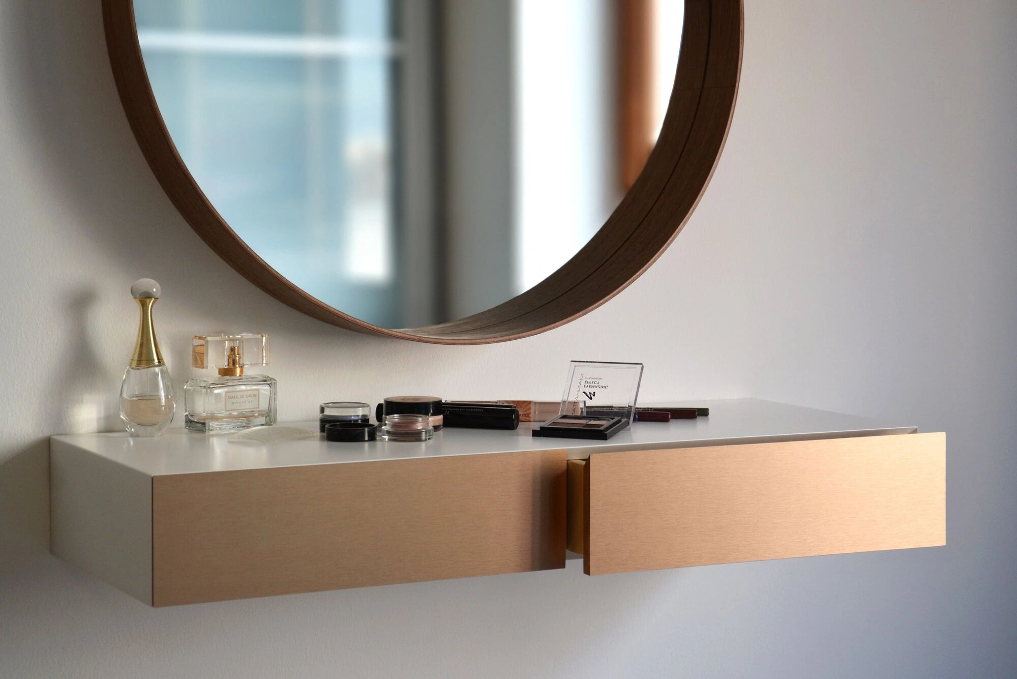 floating makeup shelf with copper drawers