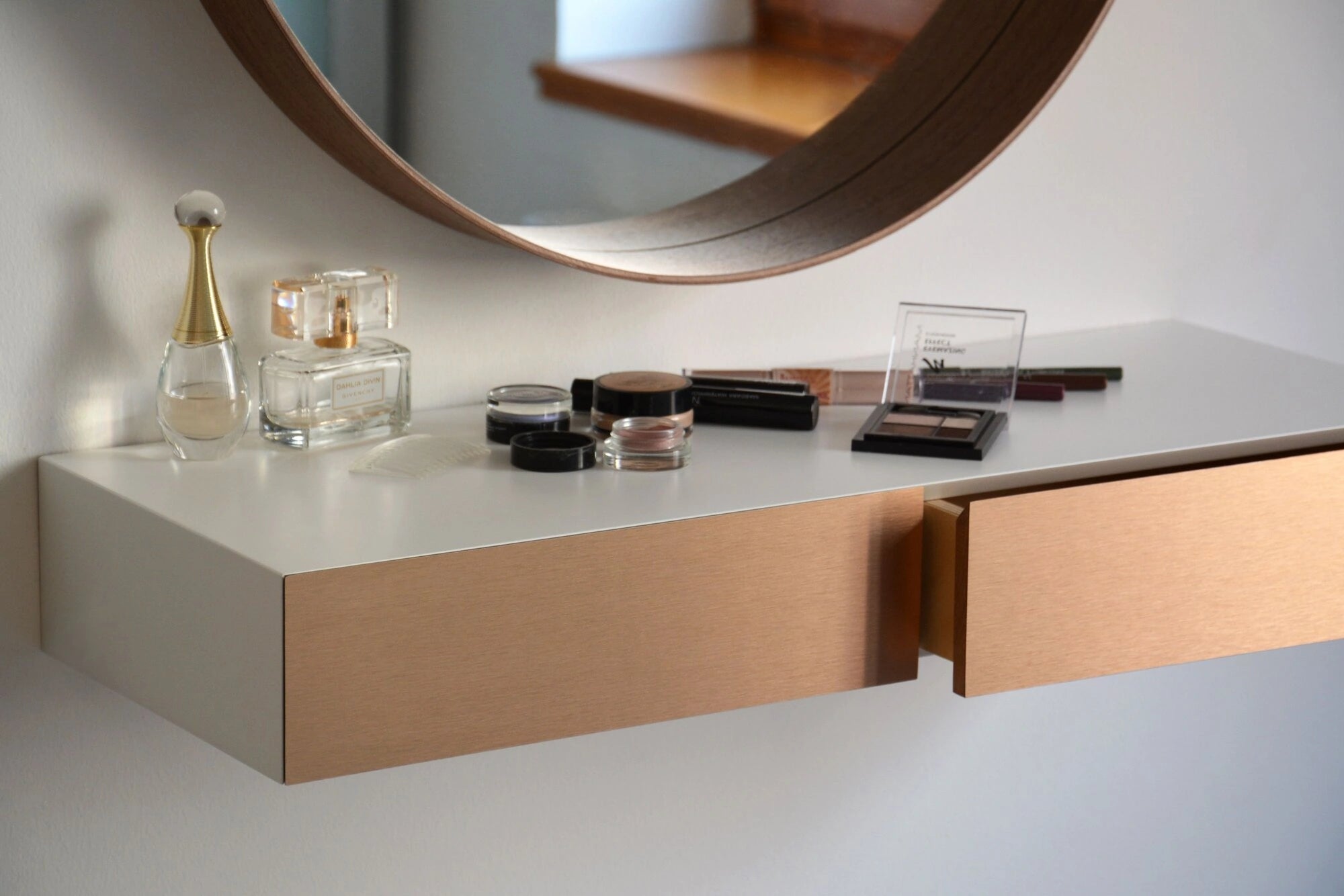 floating makeup vanity with copper drawers