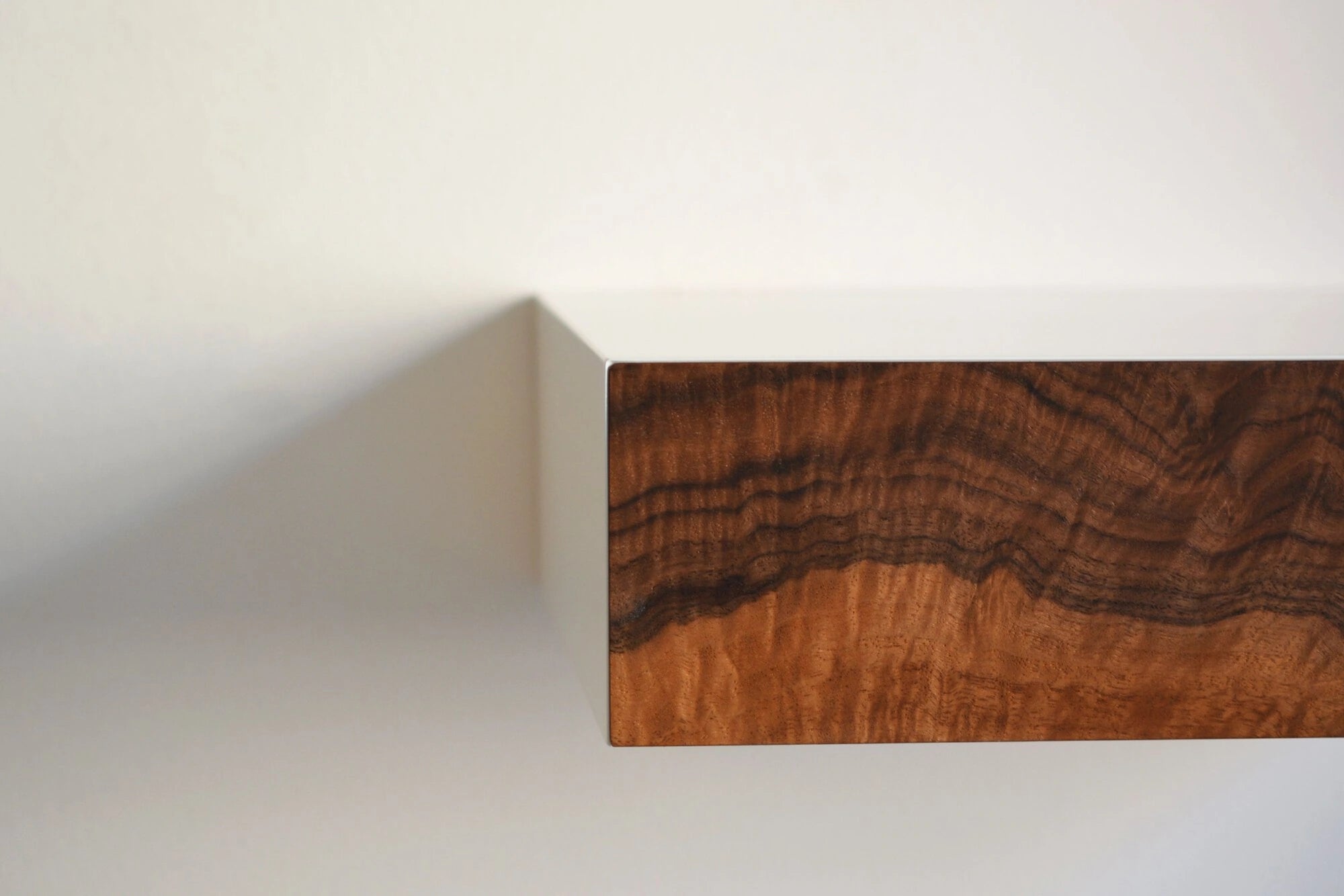 floating nightstand with burl drawer