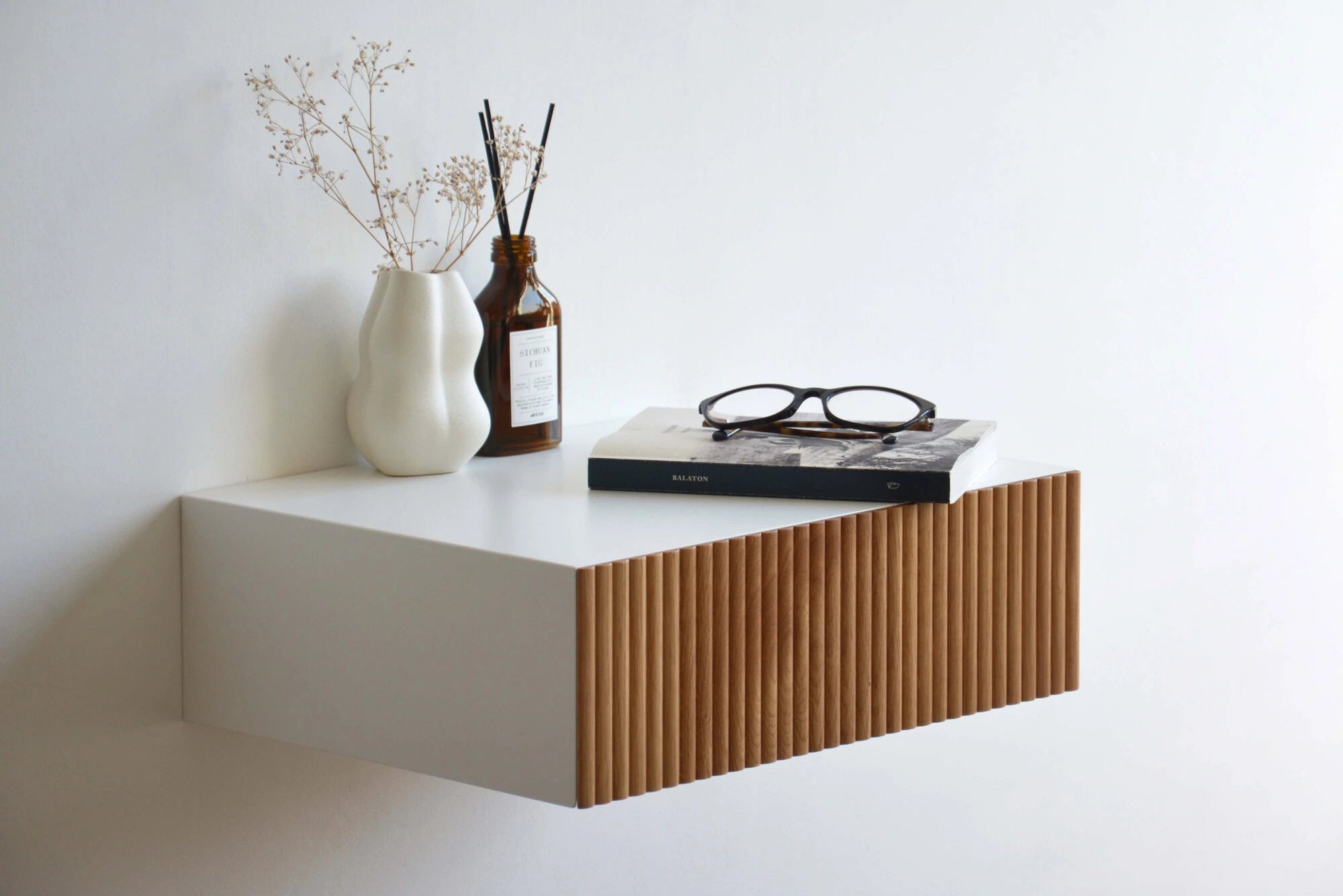 floating nightstand with fluted oak drawer