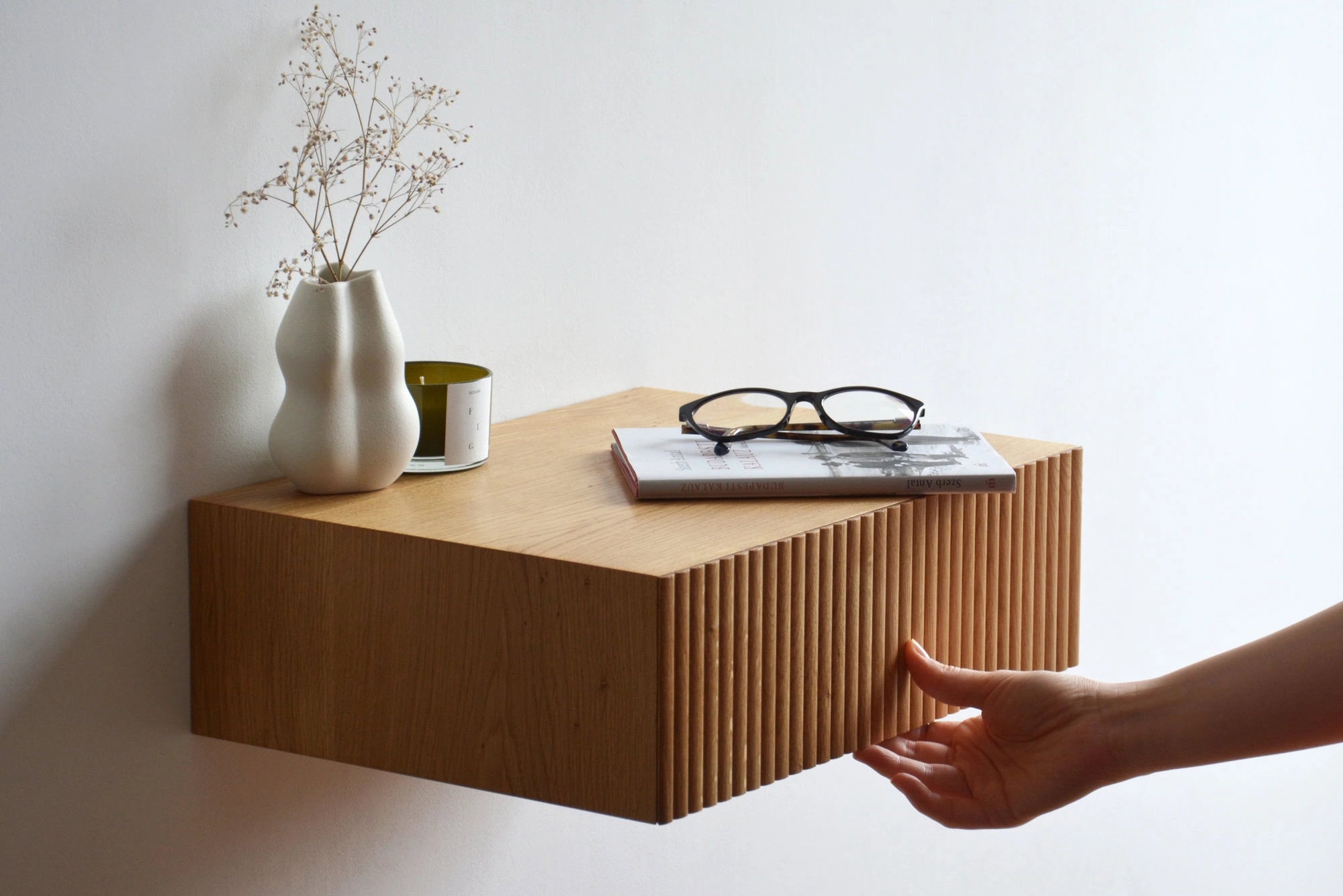 floating nightstand with fluted oak drawer