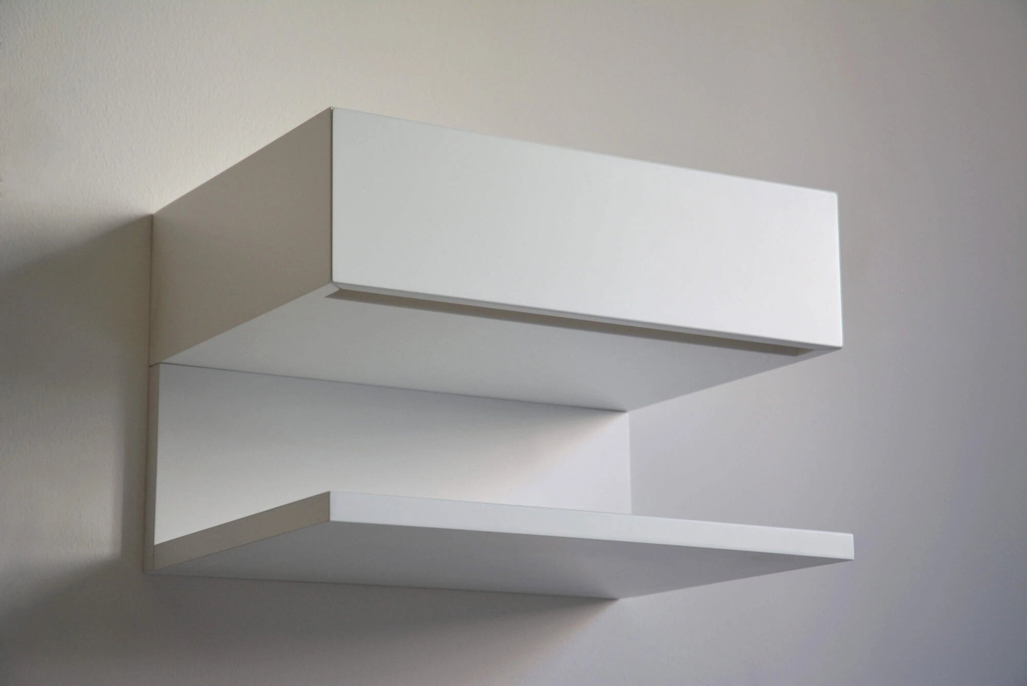 white floating nightstand