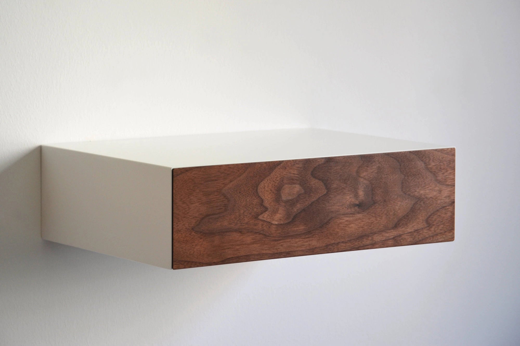 floating nightstand with walnut drawer