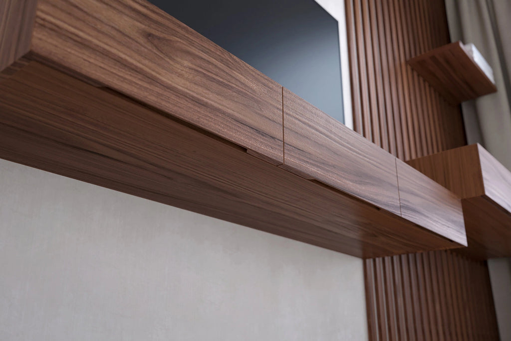 floating TV console made of walnut