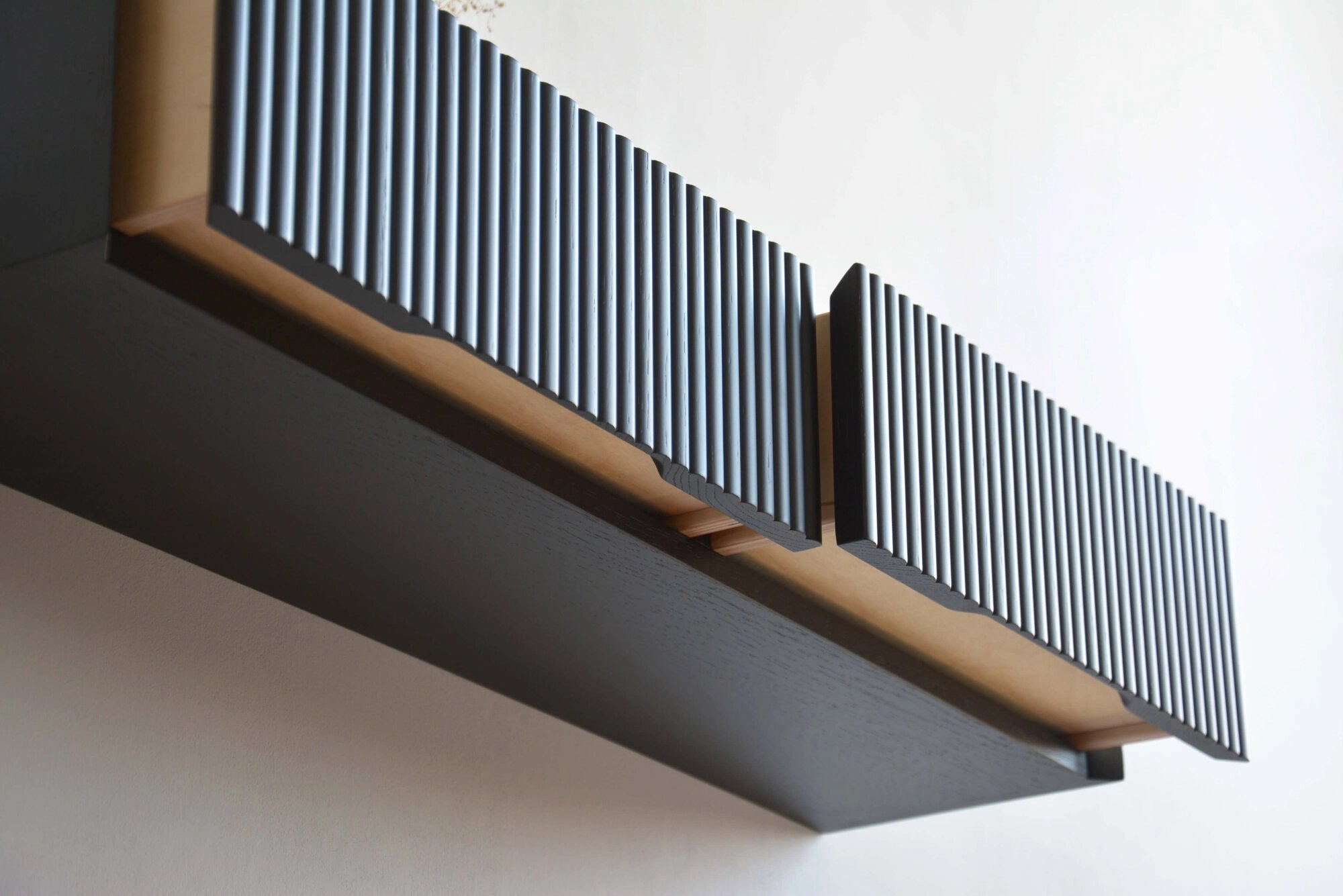 black fluted entryway shelf