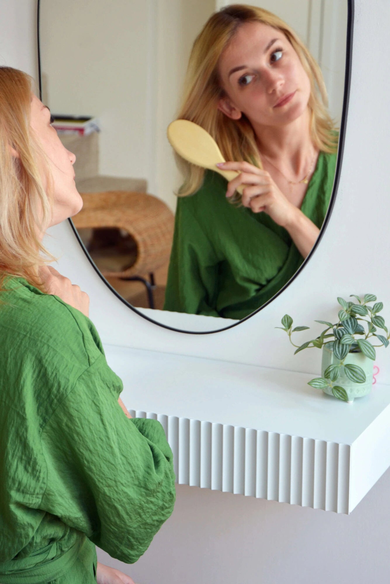 girl at fluted dressing table