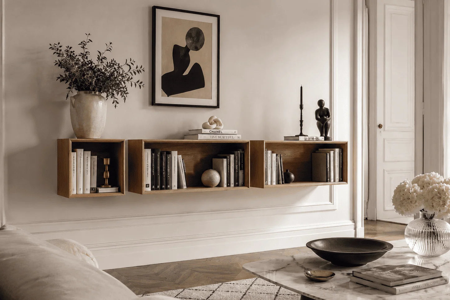 living room with floating bookshelves
