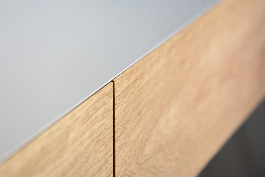 minimalist dressing table with oak drawers