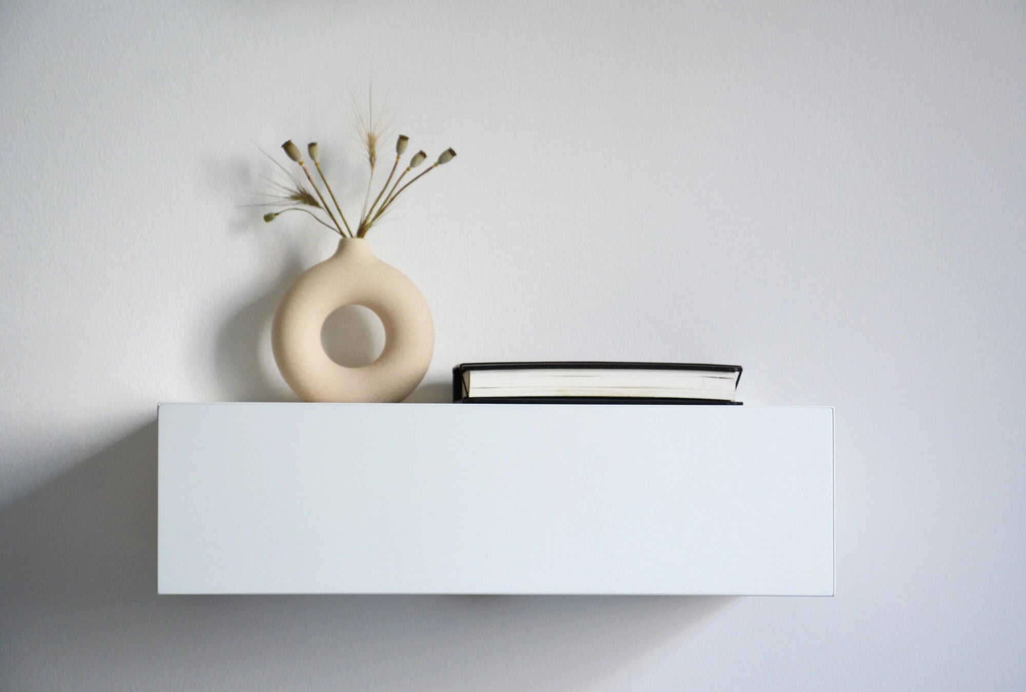 minimalist floating bedside table