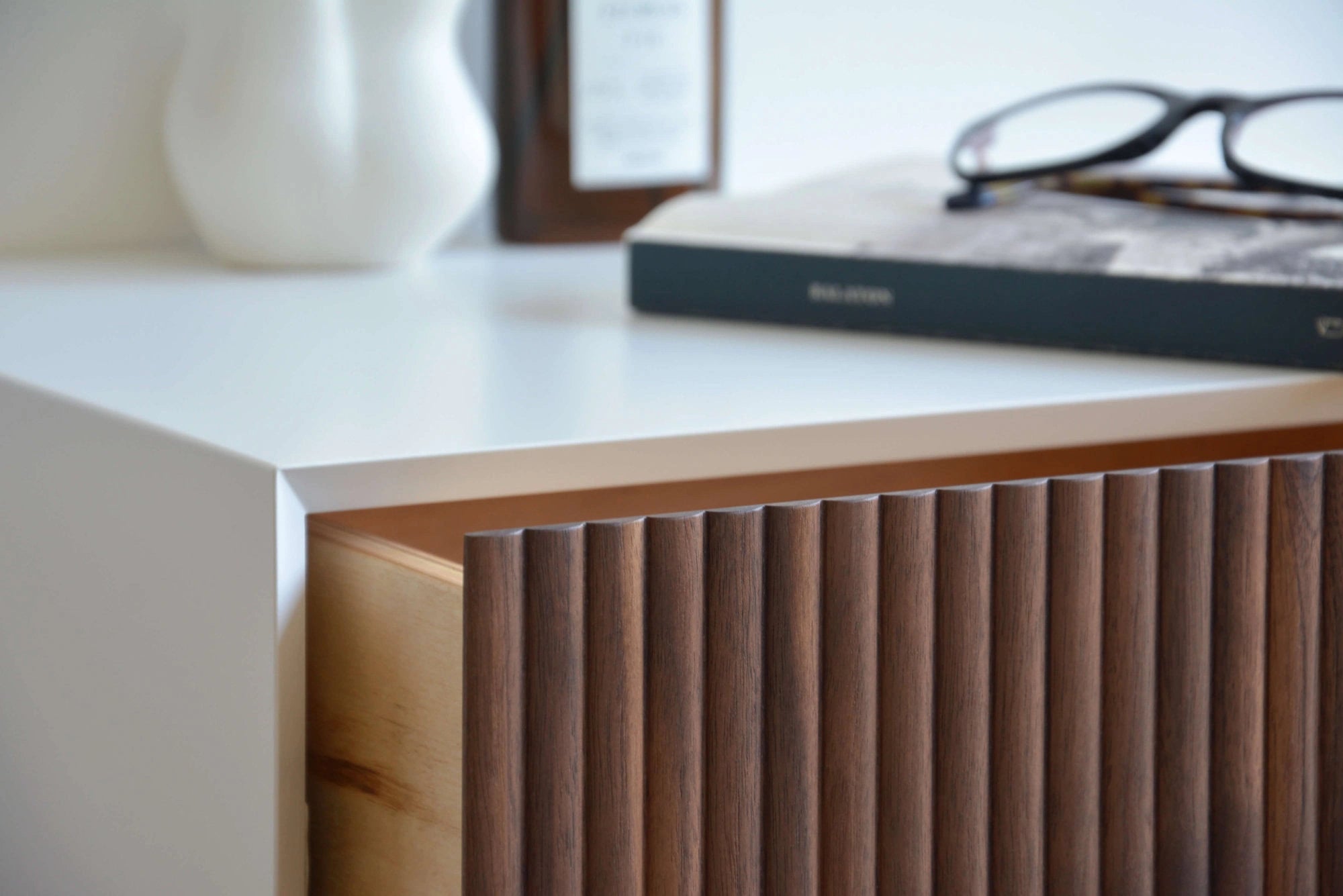 nightstand with fluted walnut drawer