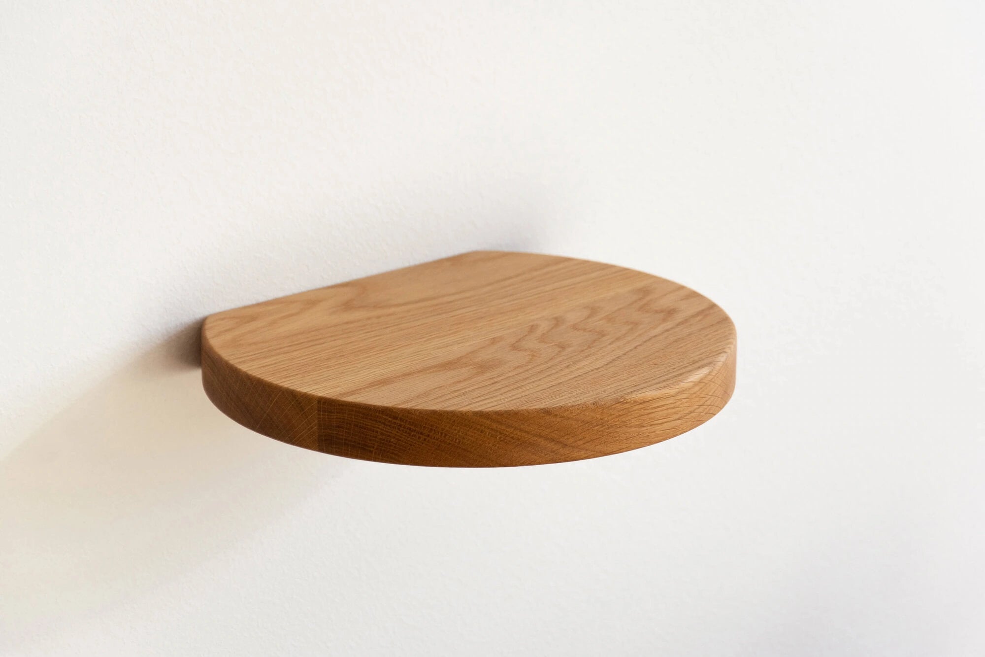 round shelf made of solid oak