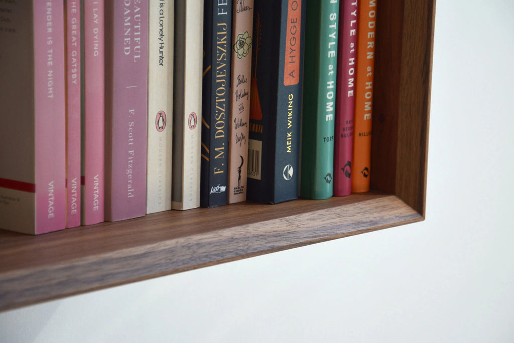 walnut bookshelf with mitered design