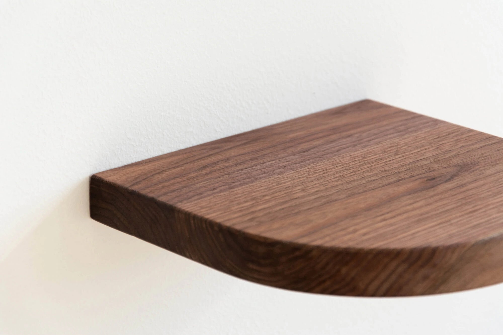 walnut floating shelf with arch shape