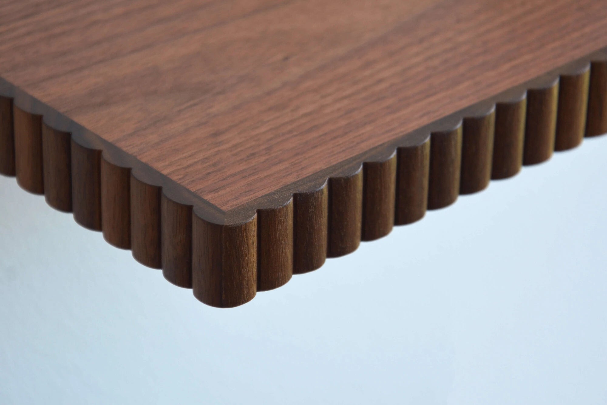 walnut shelf with fluted edges