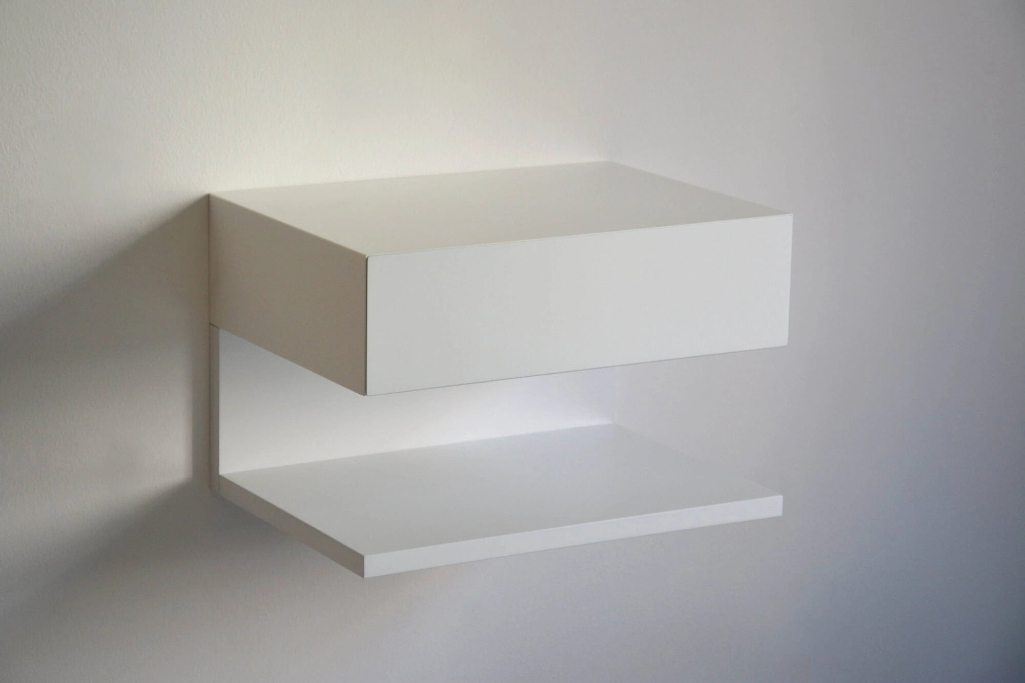 white floating nightstand