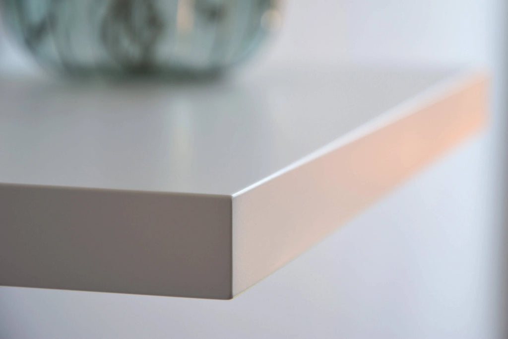 white floating shelf edge