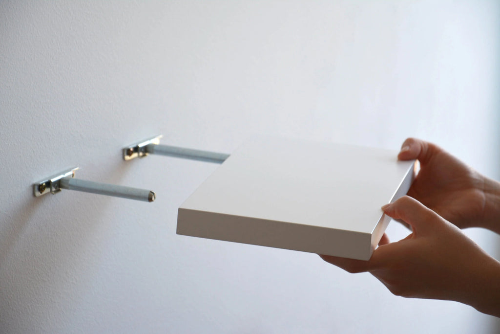 white floating shelf mounting