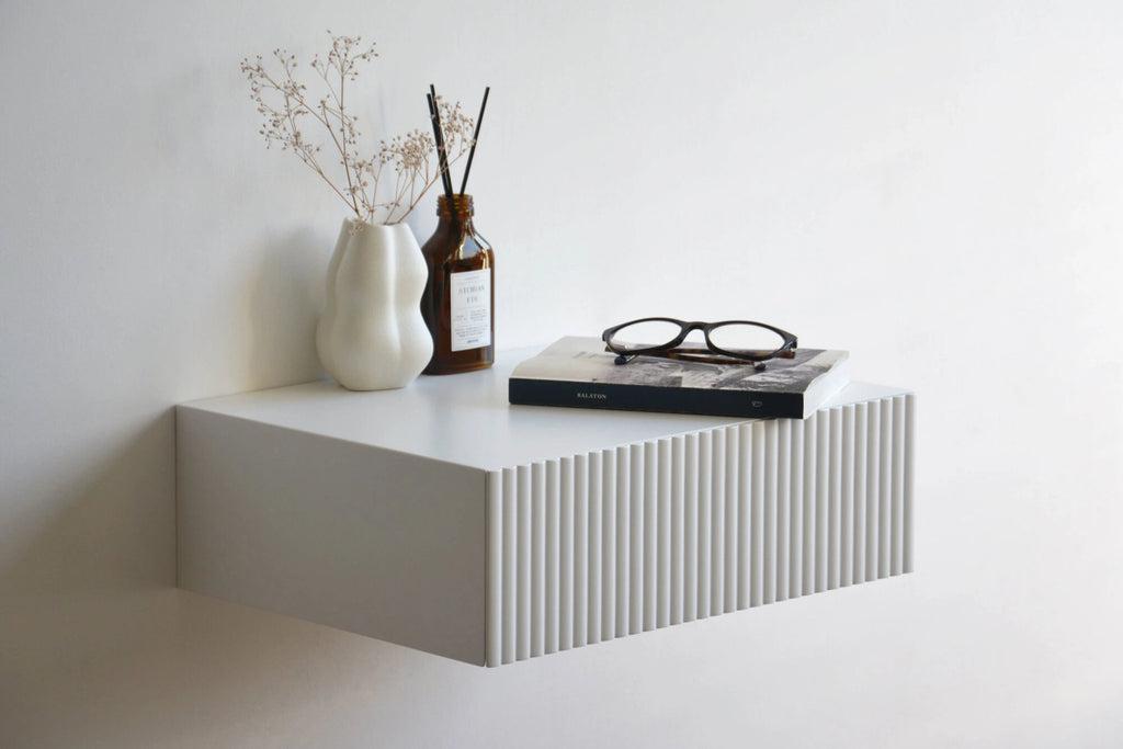 white fluted bedside table