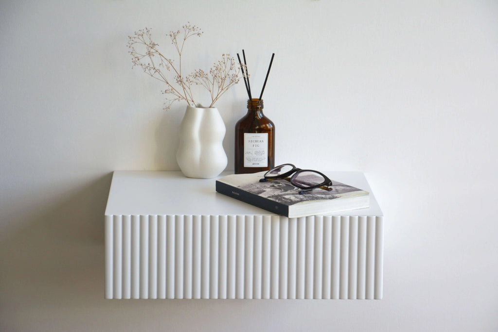 white nightstand with fluted drawer