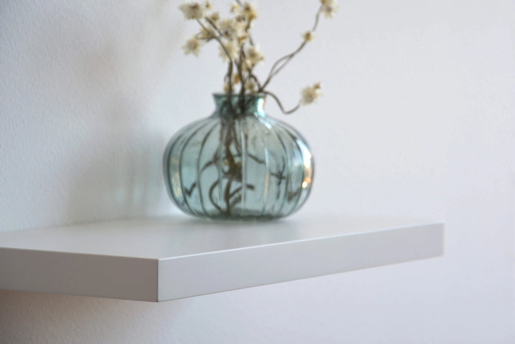 white wall shelf